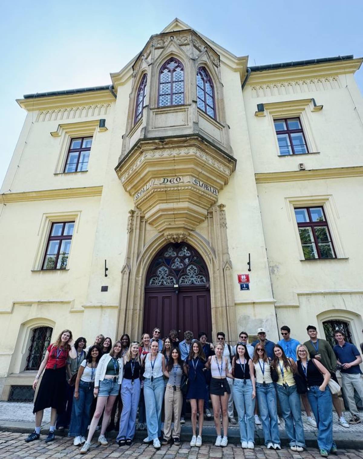 Students posing in front of CIEE Prague center