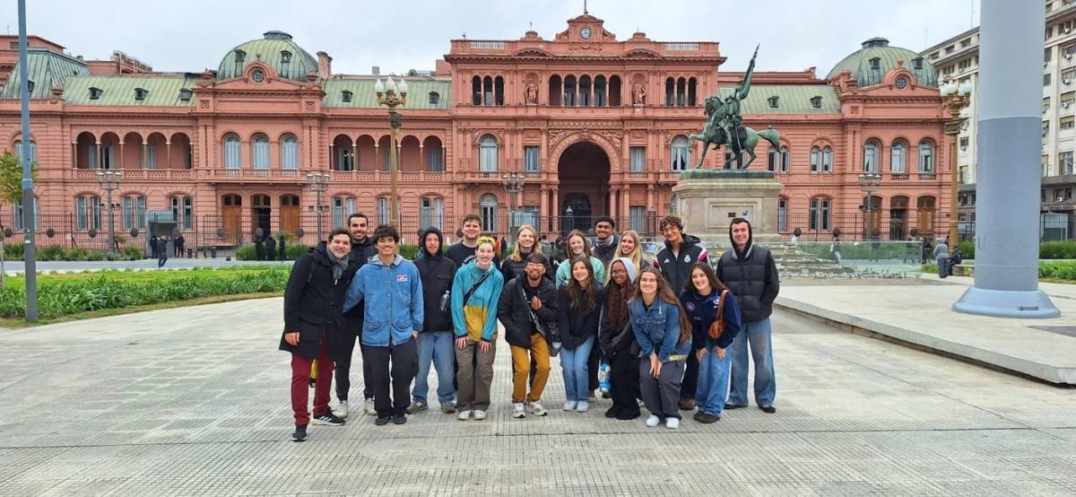 Students posing in front of historic building in Buenos Aires