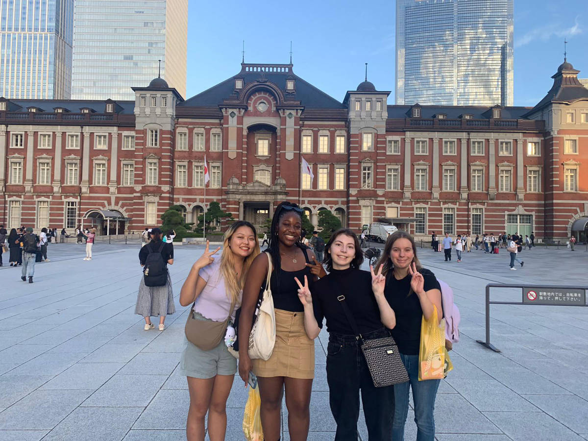 Students posing outside Tokyo Tower
