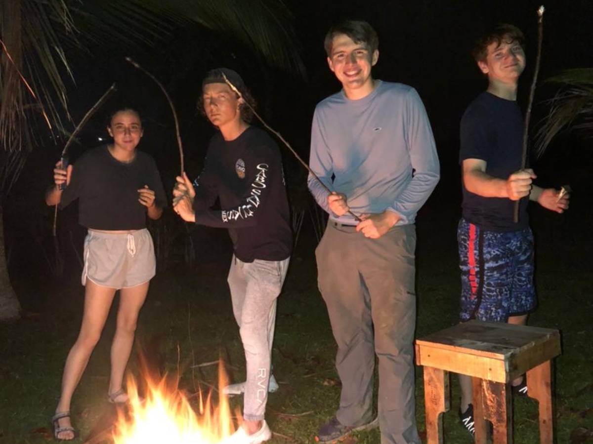 Students roasting marshmallows