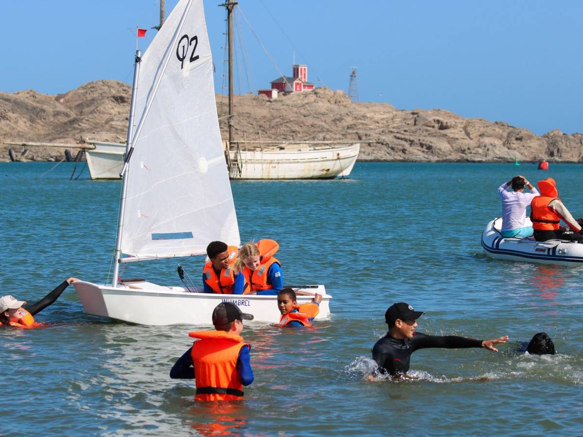Students sailing and swimming in Lüderitz bay