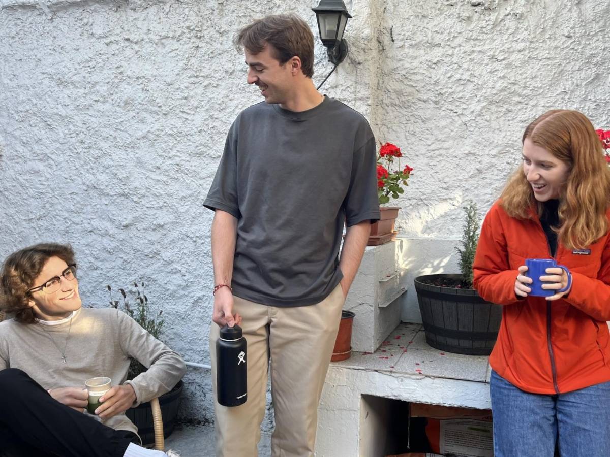 students socializing on the patio of the IES Abroad Santiago Center