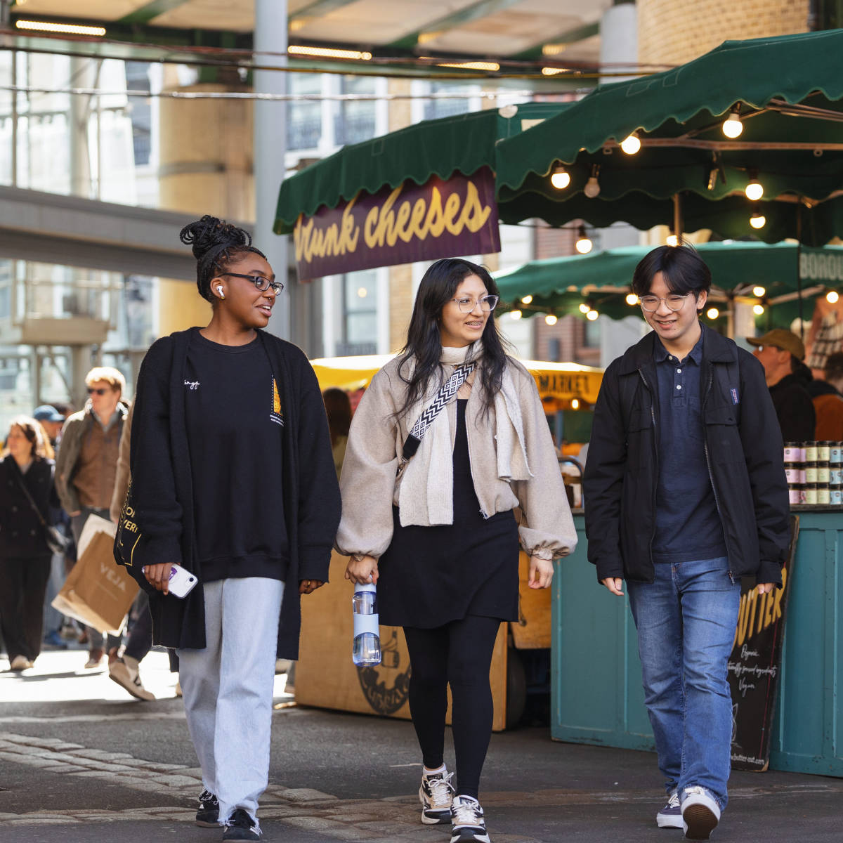 Students walking in the market.