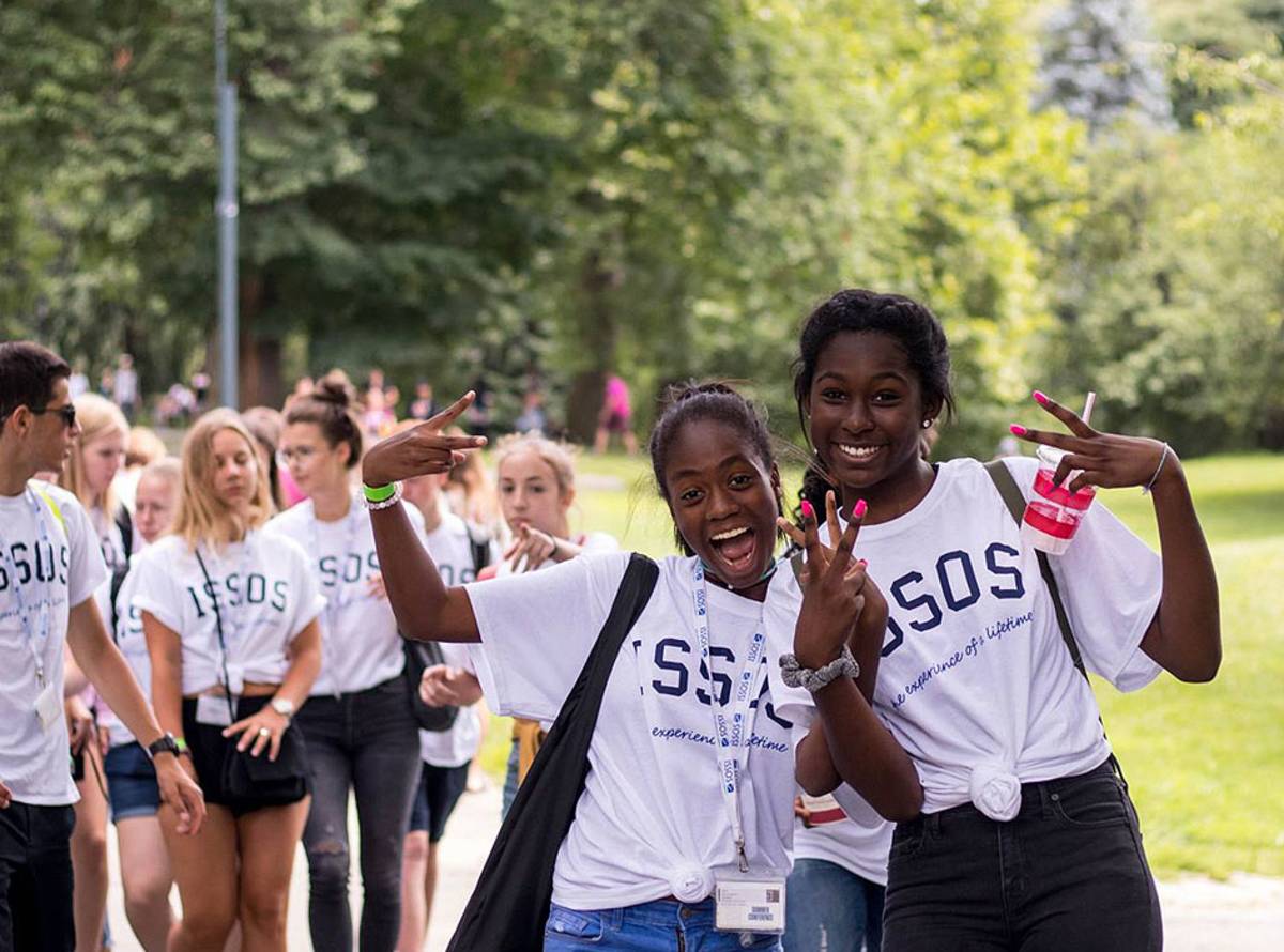 students wearing ISSOS shirt