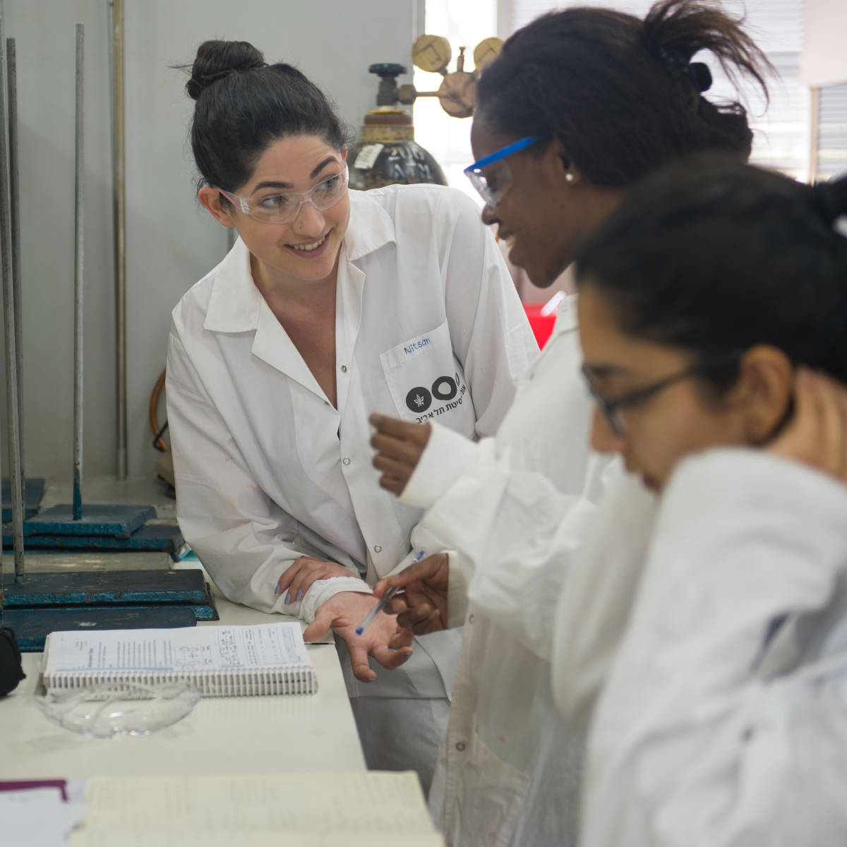 Students work in a science lab.