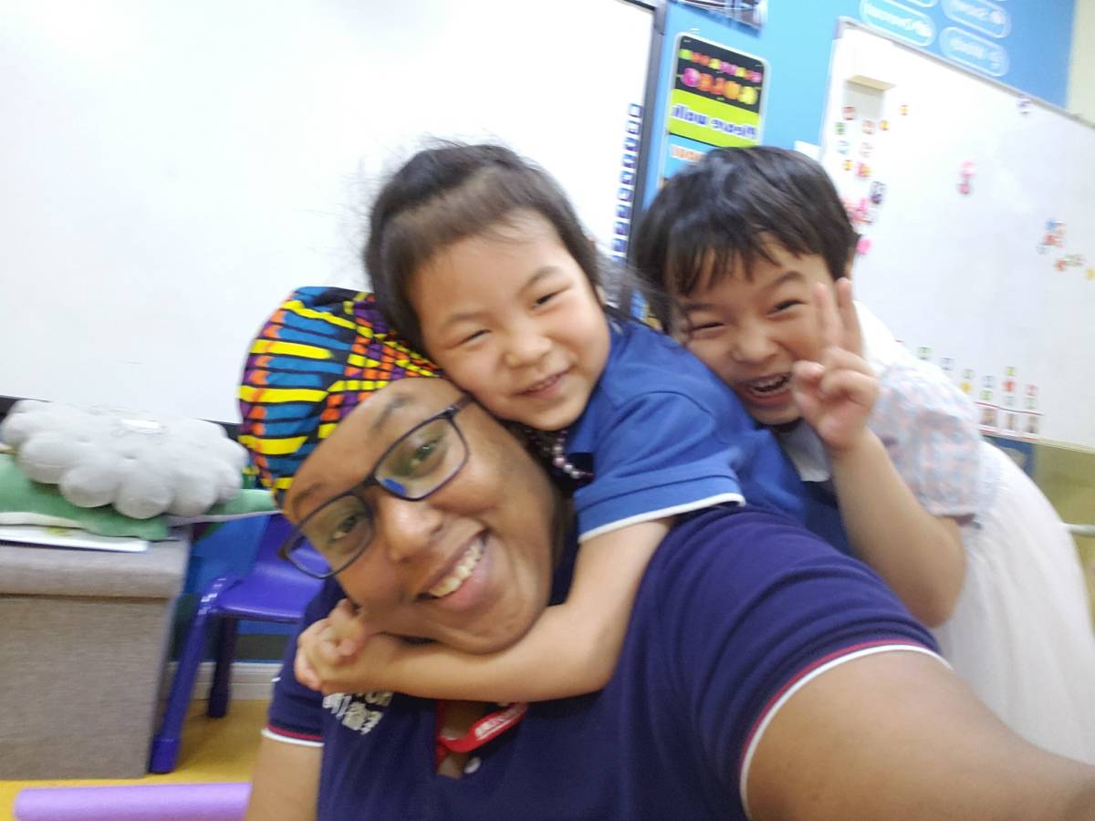 Teacher playing with kids