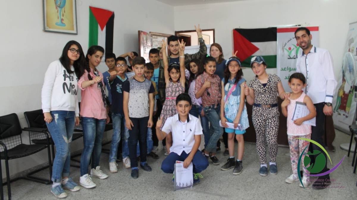 Teaching English to Palestinian children at a community center in Dura Hebron