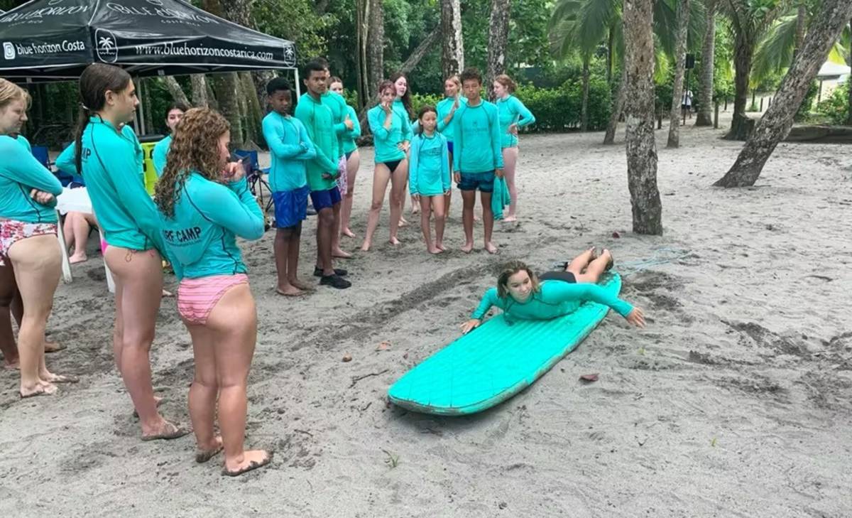 Teen Volunteers Learning to Surf in Costa Rica