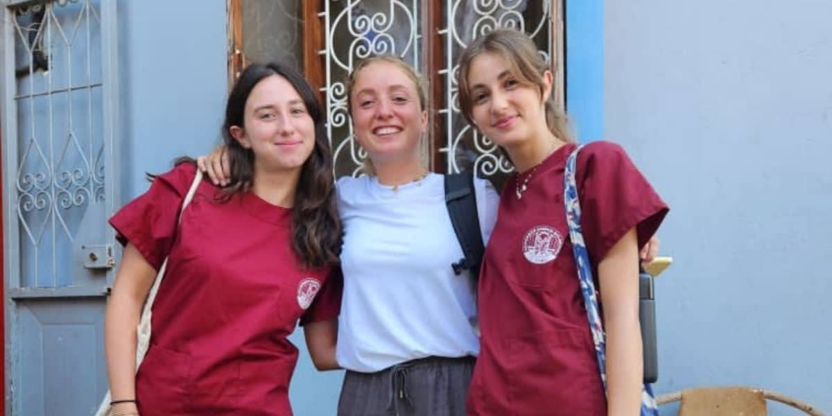 Three smiling women.