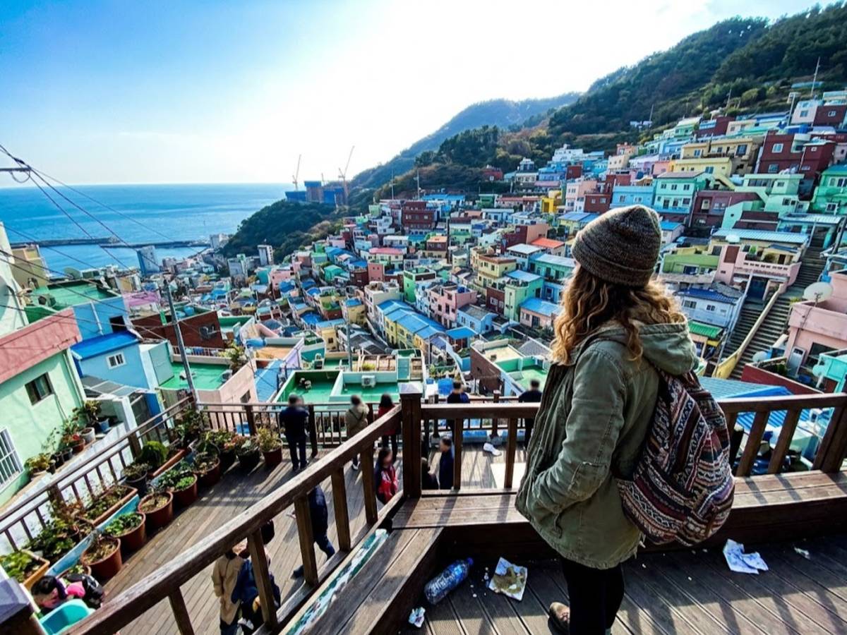 Traveller looking over colorful houses in Gamcheon Culture Village