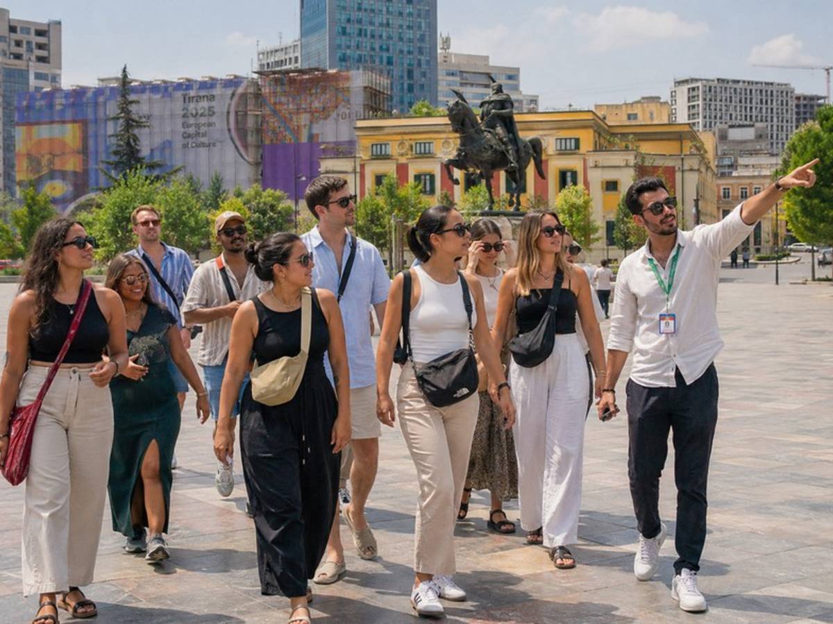 Travellers joining a guided tour of central Tirana