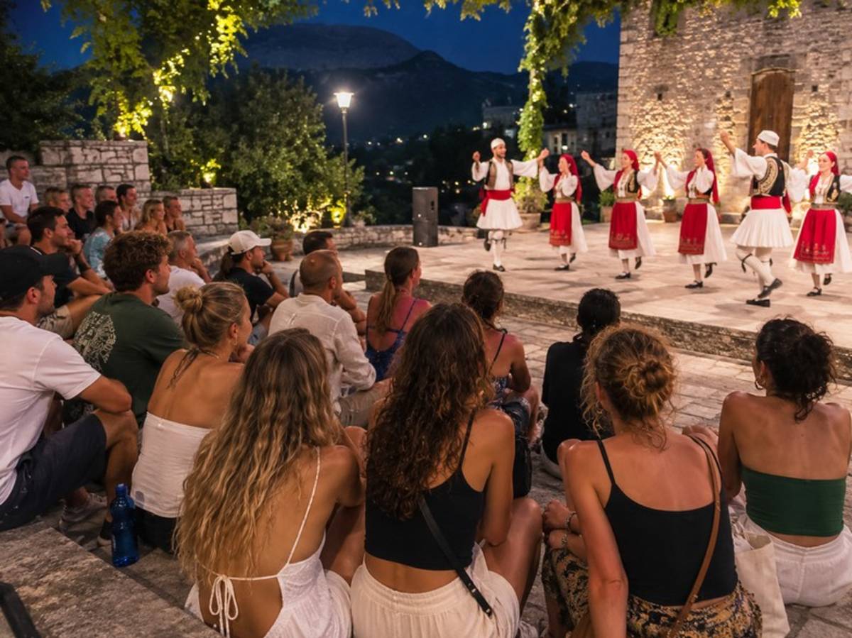 Travellers watching a traditional Albanian folk performance