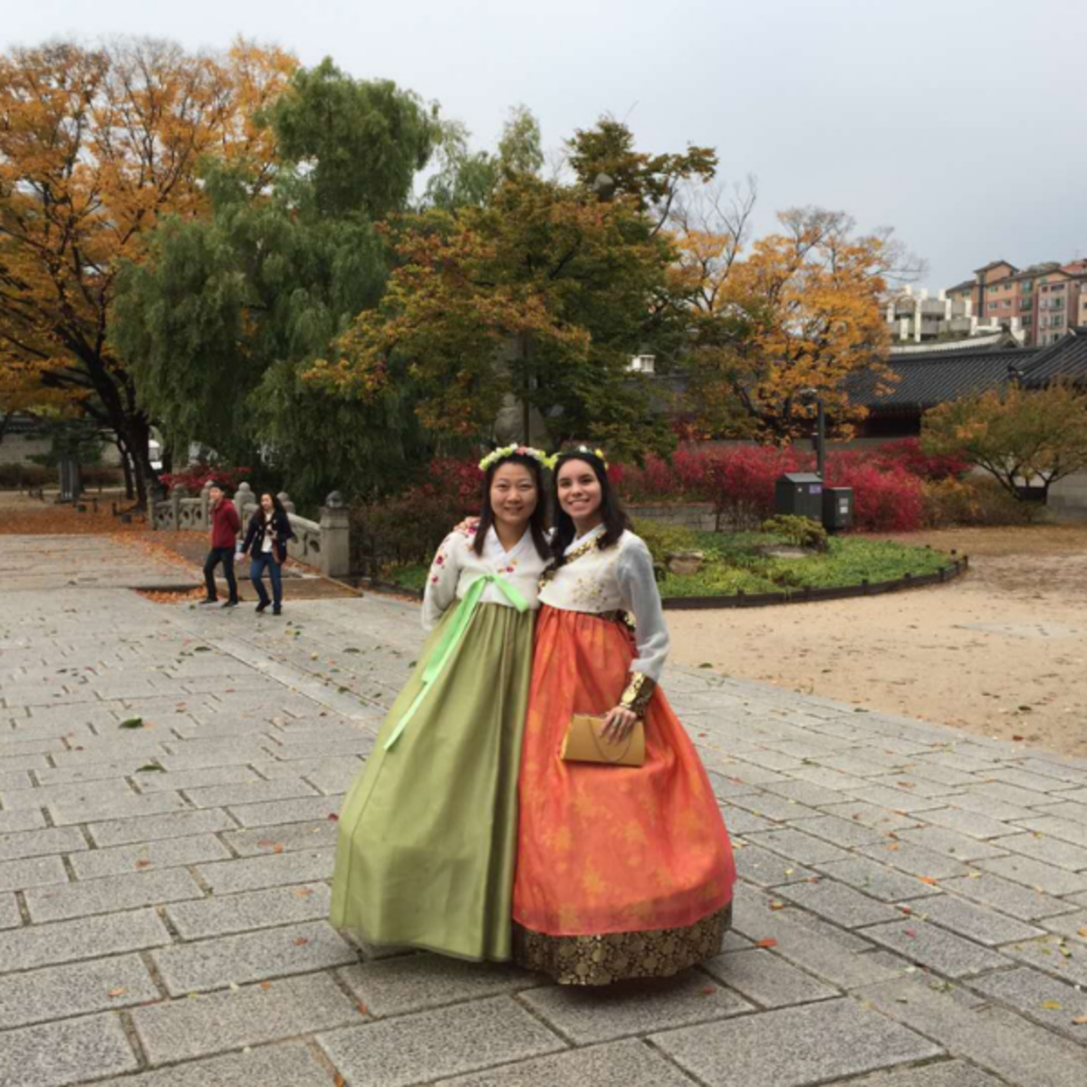 Two girls wearing beautiful traditional Korean dresses