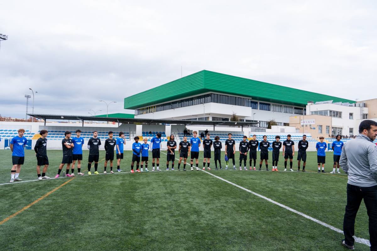 two soccer teams lined up