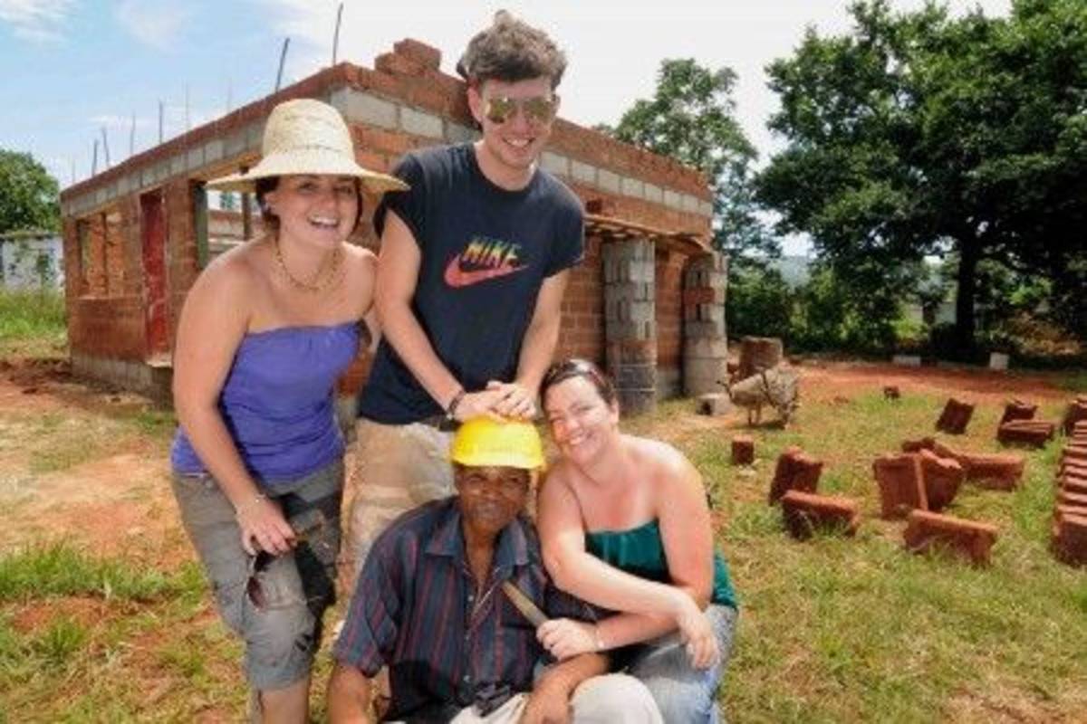 Volunteers and Swazi builder Volunteer Building with Kruger Safari in Swaziland
