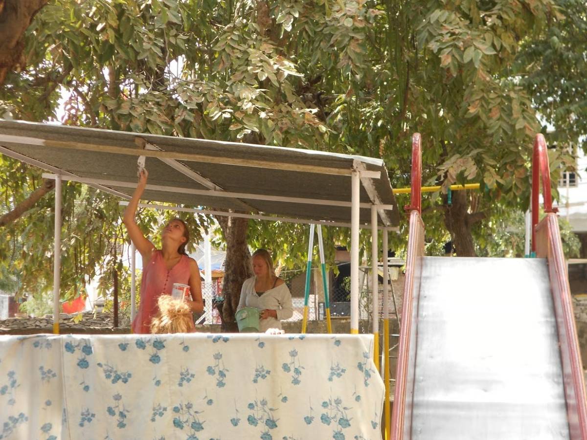 volunteers constructing a play area