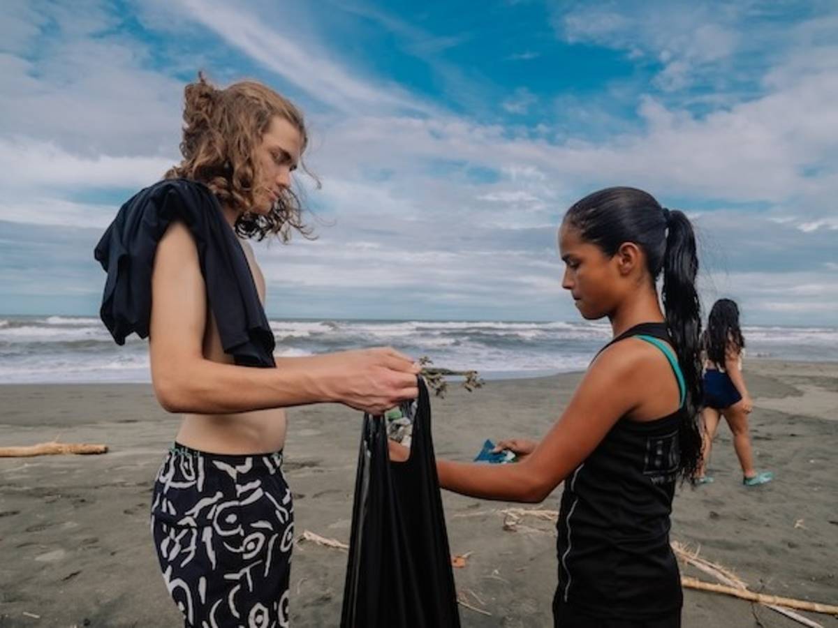 Volunteers doing a beach cleanup on a local beach in Costa Rica