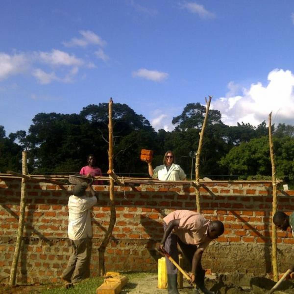Volunteers building a clinic in Uganda, Africa