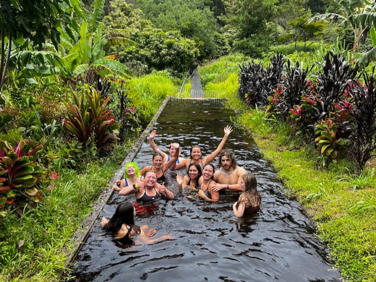 Volunteers swimming in Hawaii after local volunteer project