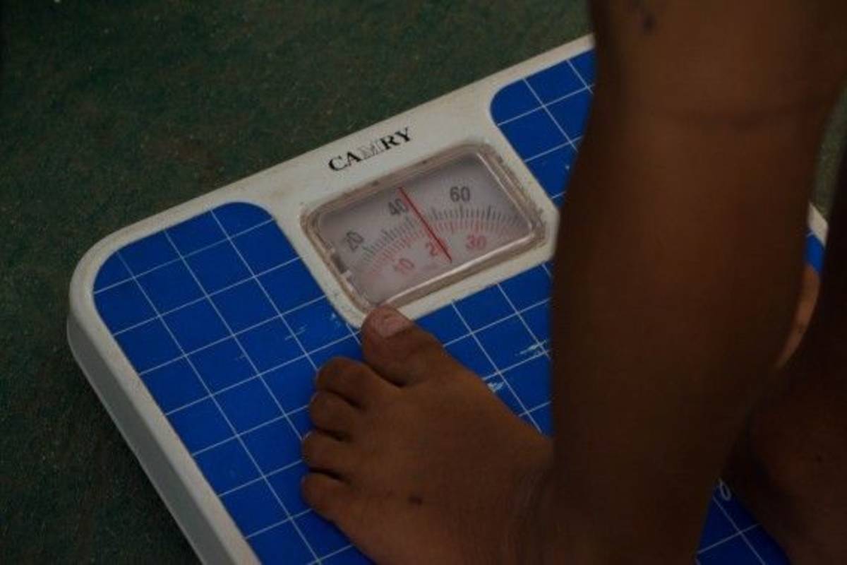 Child checking his weight
