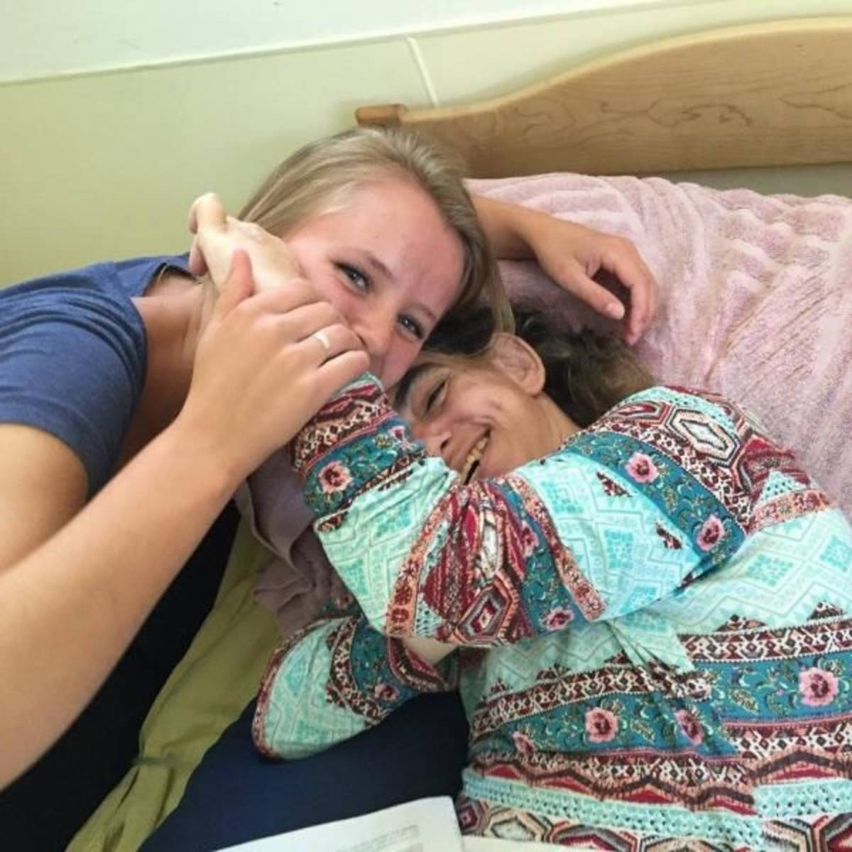 Volunteer works with disabled child