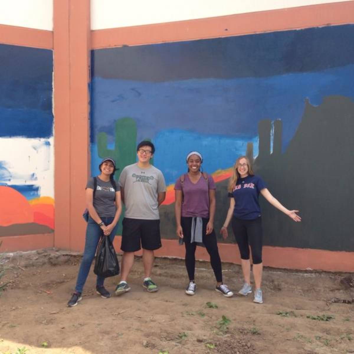Painting a mural at the boys' foster home in Trujillo
