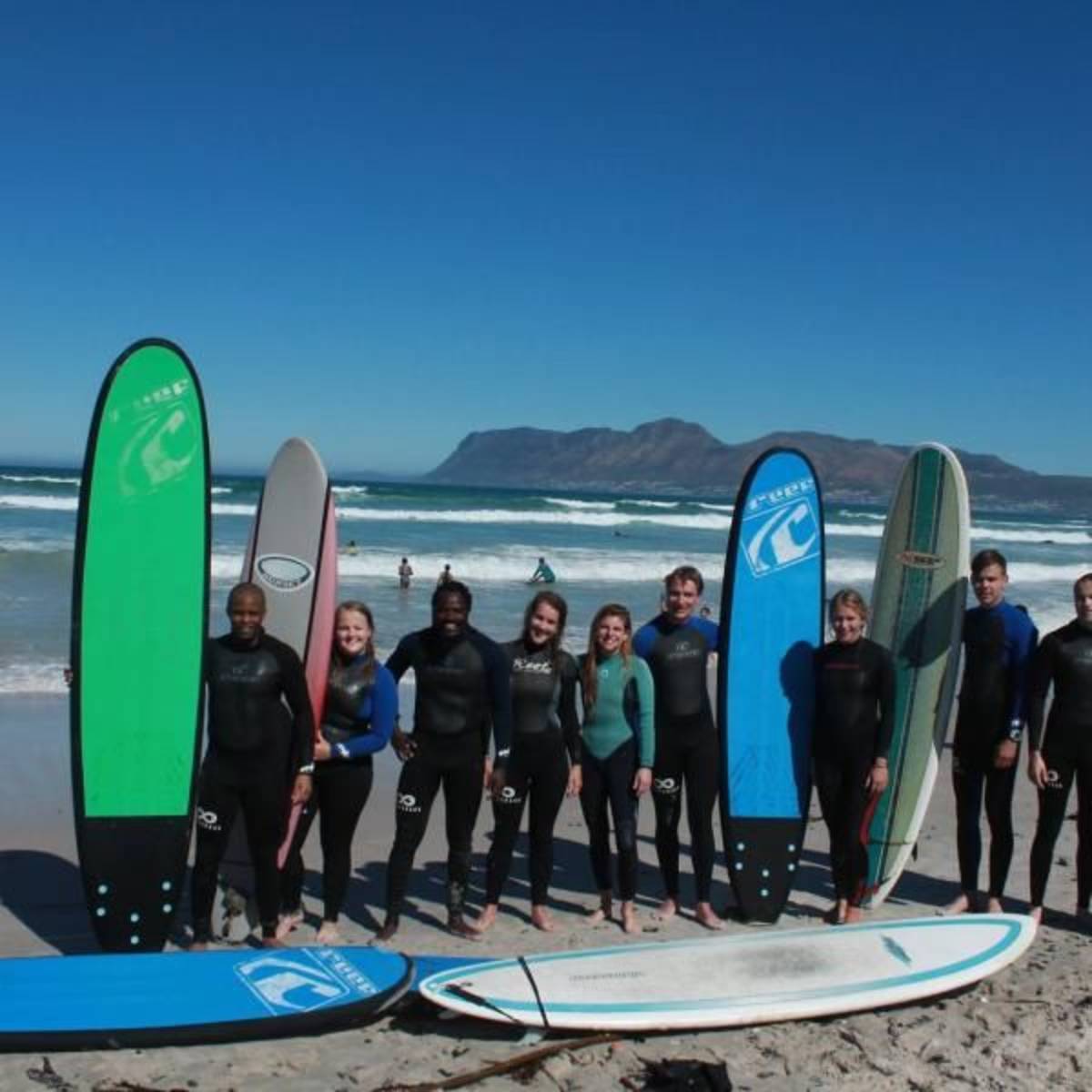Student interns learn to surf in Cape Town South Africa