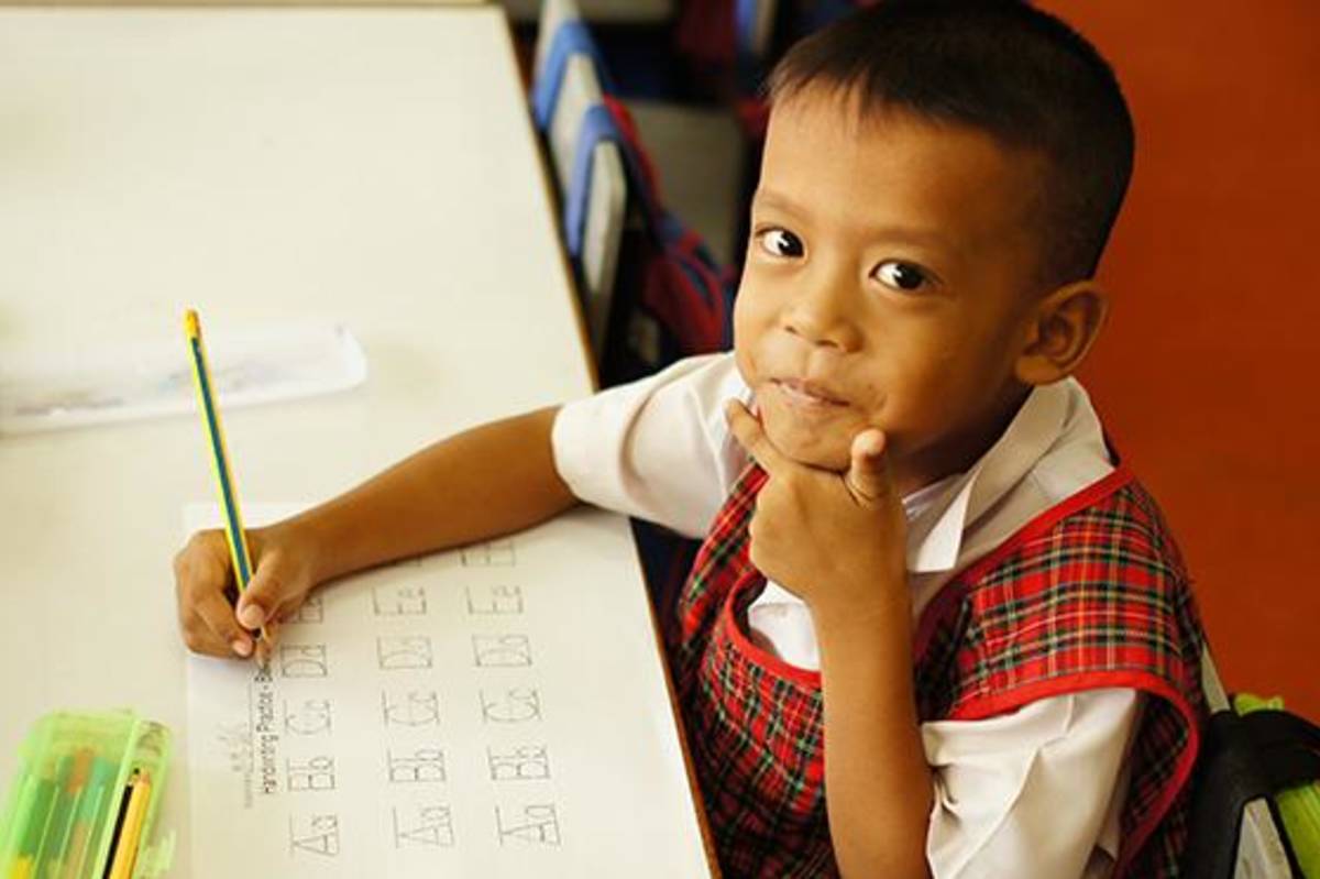 One of the adorable kindergarten students you can expect to teach in Thailand