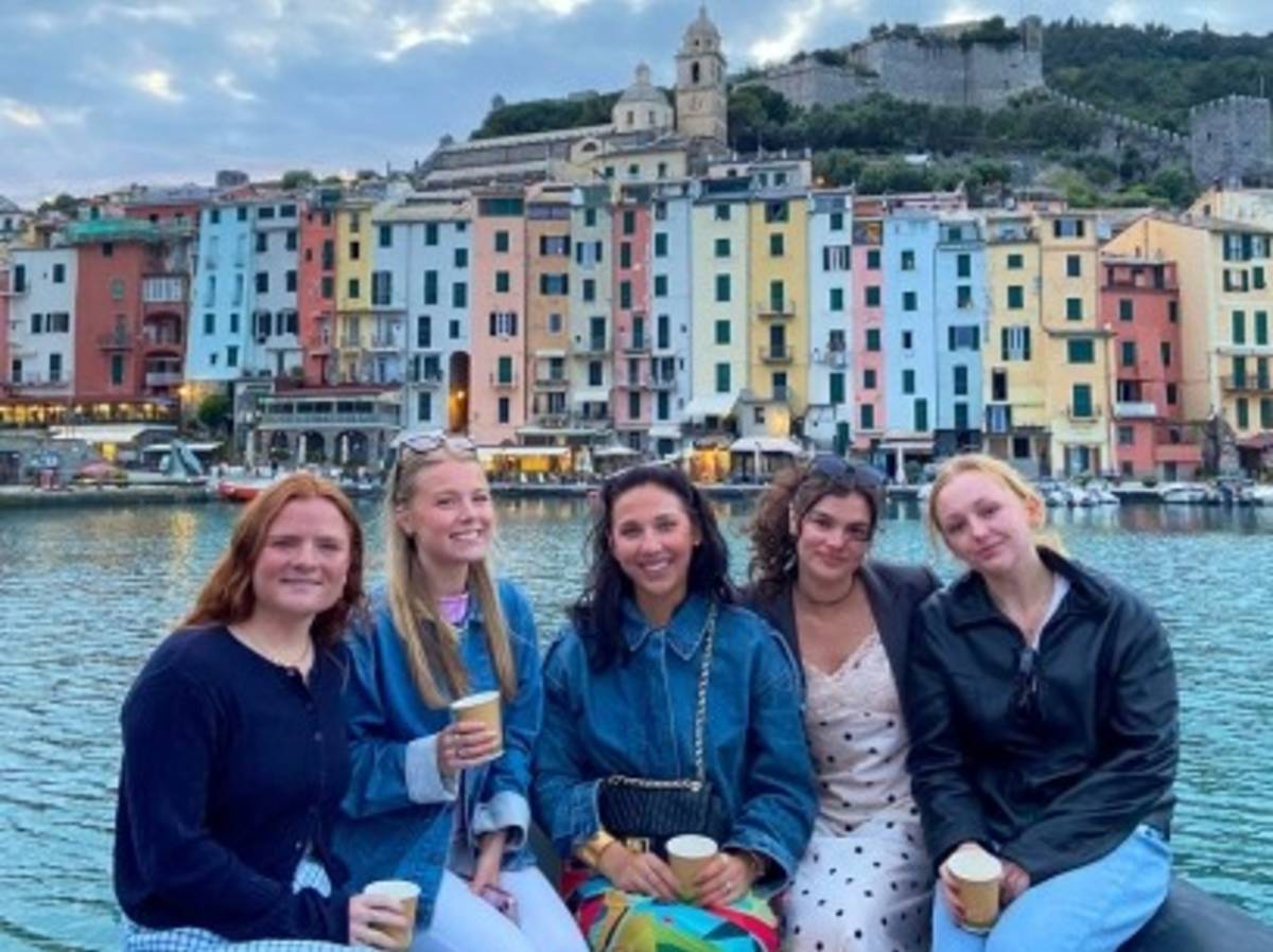 5 students on a boat