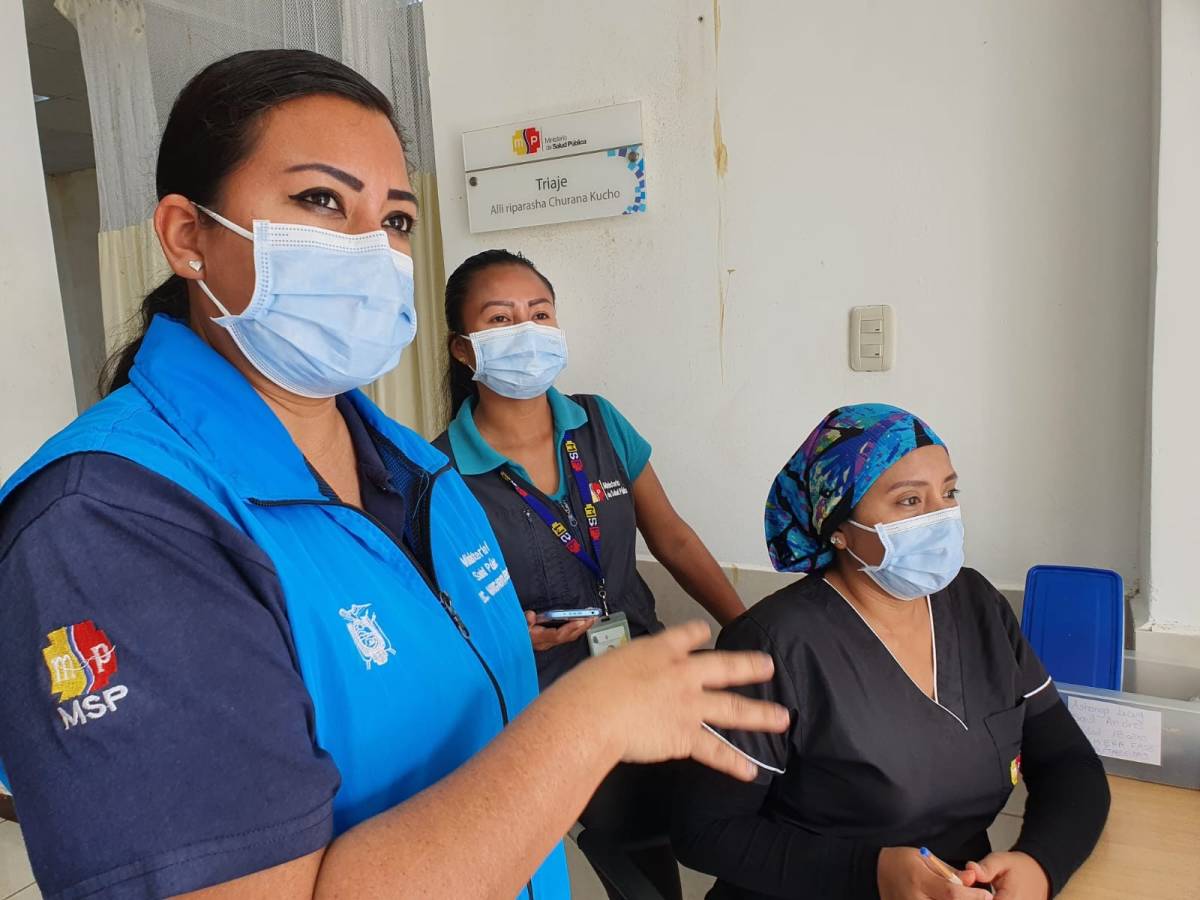 A close up of doctors in masks.
