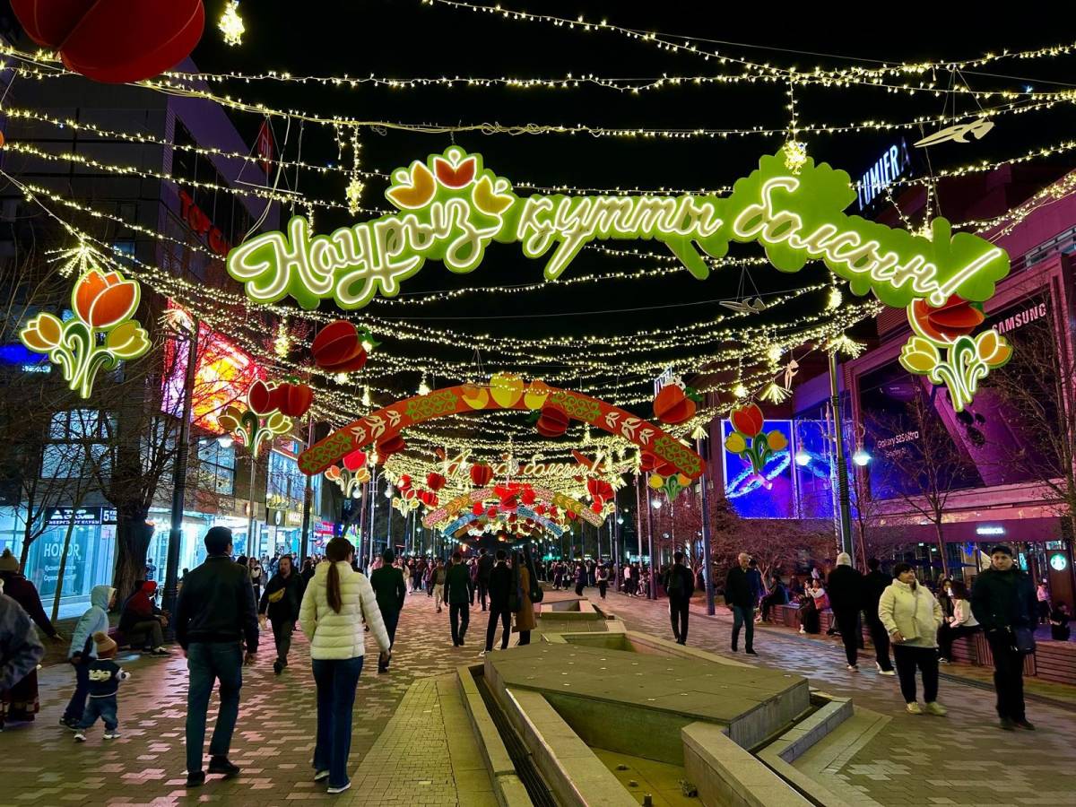 A festive street market at night