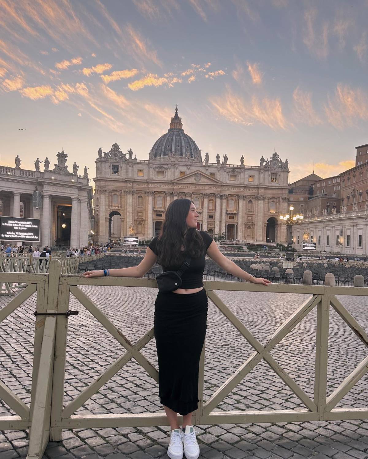 a girl poses in Rome