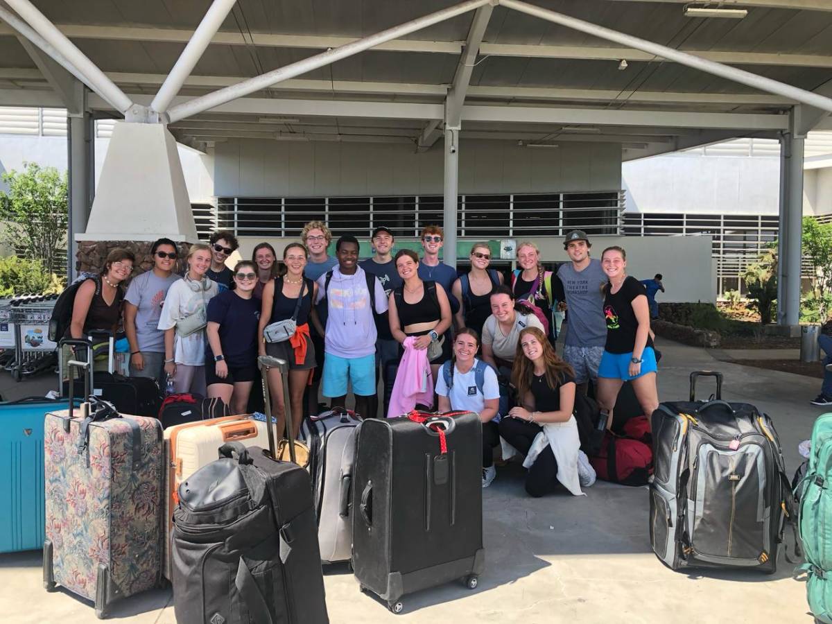 a group of travelers with their luggages