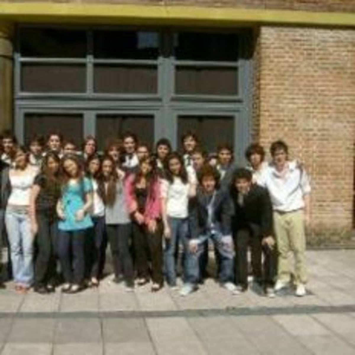 A group of young people smiling