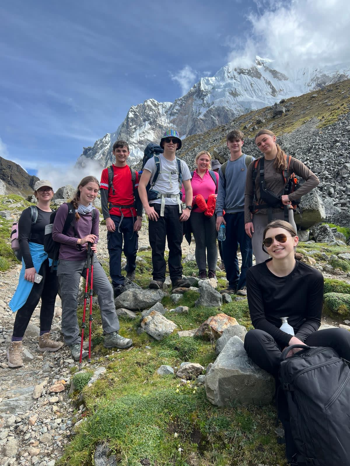 a hiking group poses for a photo
