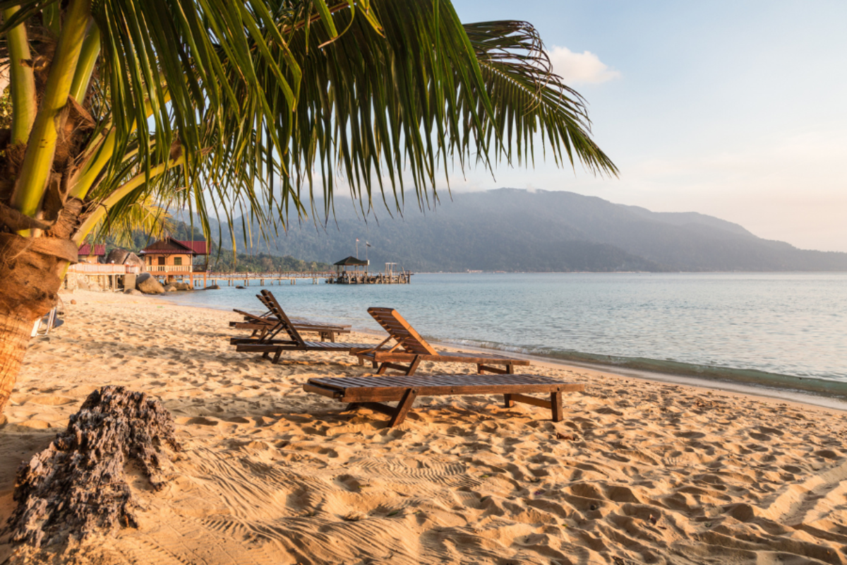 a tropical coastline with sandy beaches and calm waters