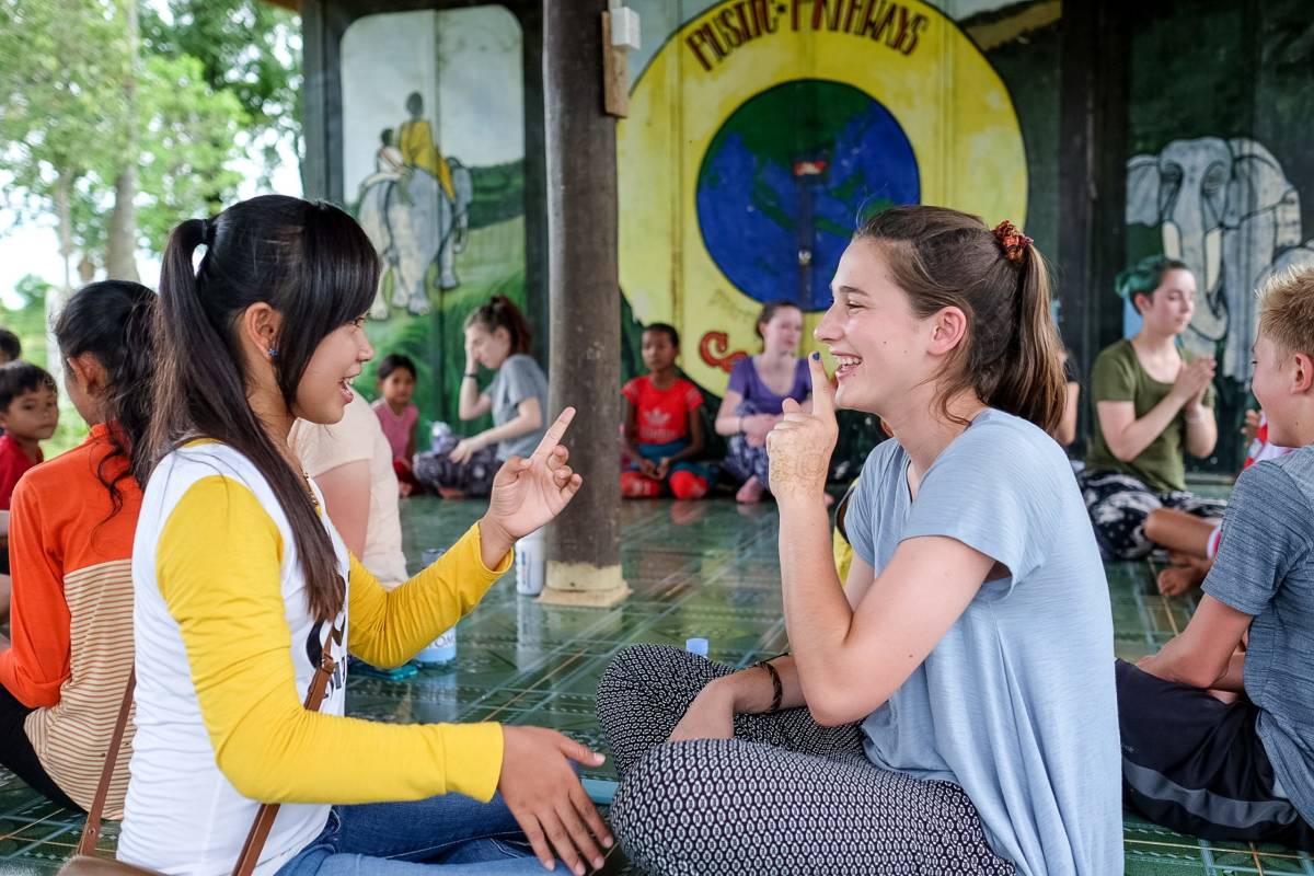 American student connecting with a Cambodian student