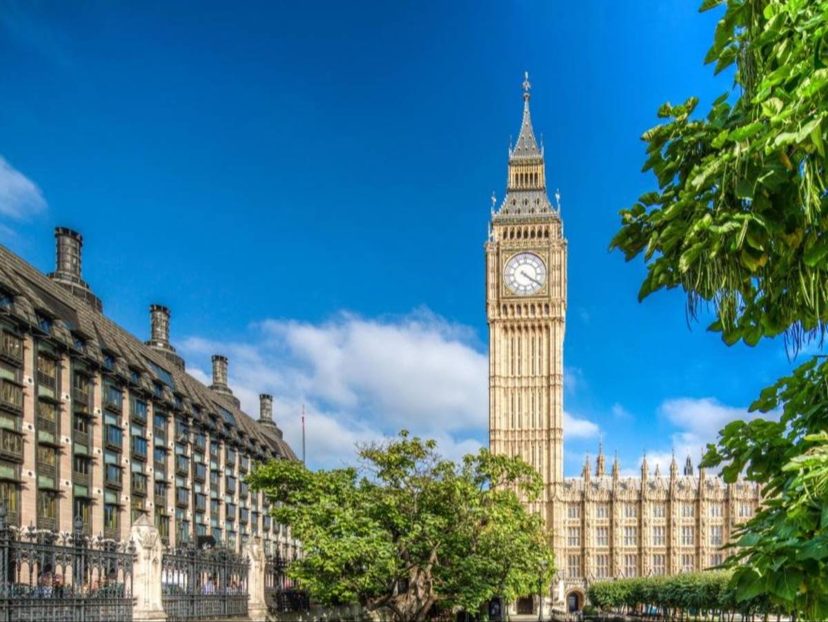 Big Ben and the Houses of Parliament on a sunny day in London.