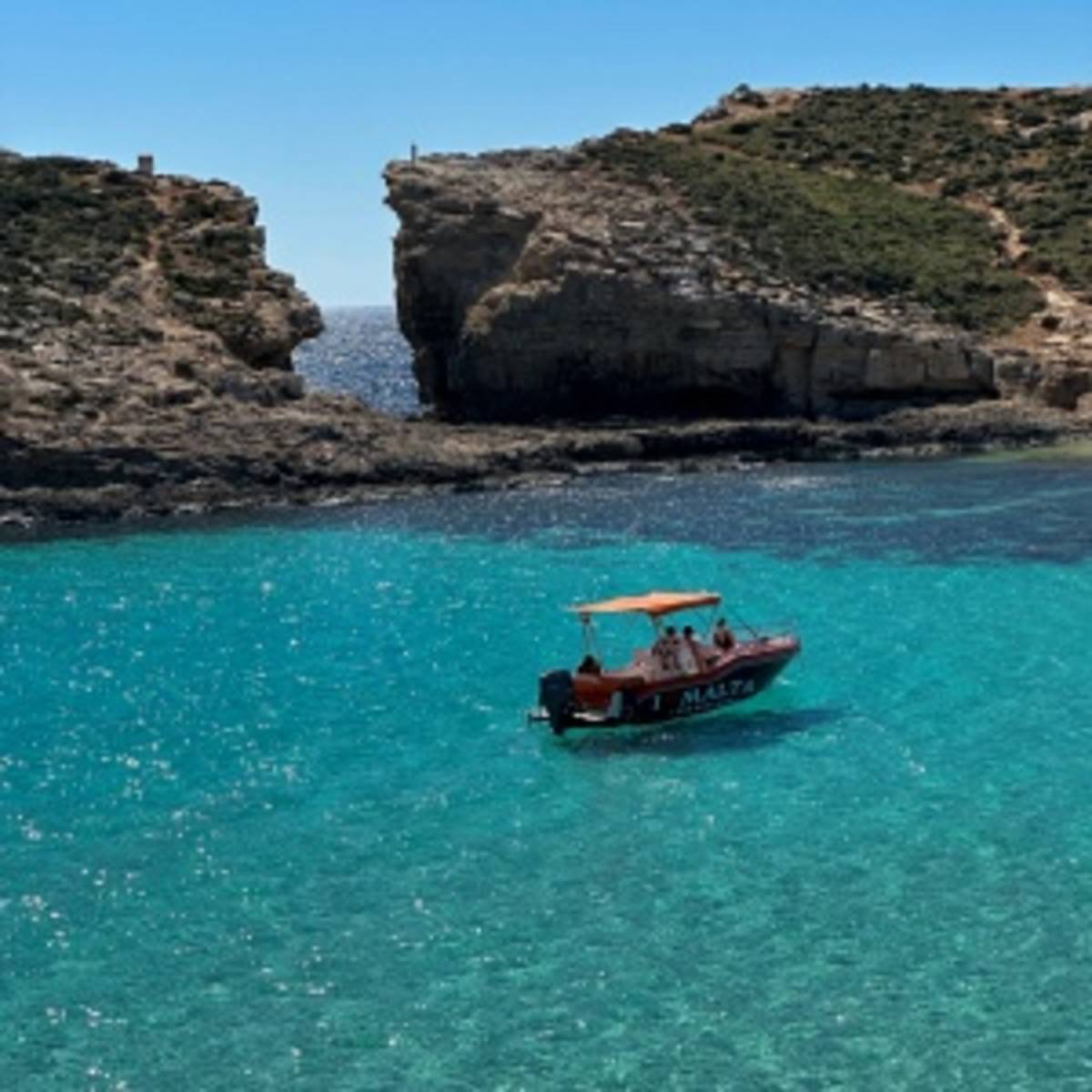 blue water and boat