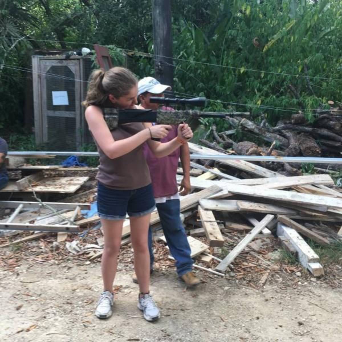 student shoots tranquilizer gun