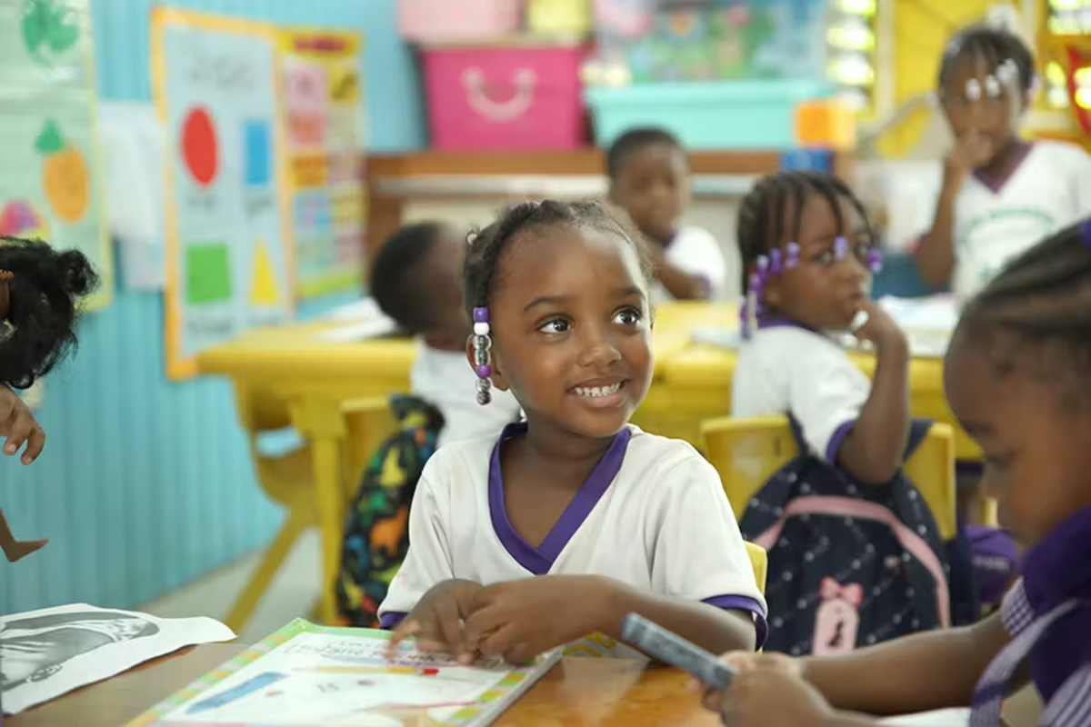 Child Learning from IVHQ Volunteer in St Mary Jamaica
