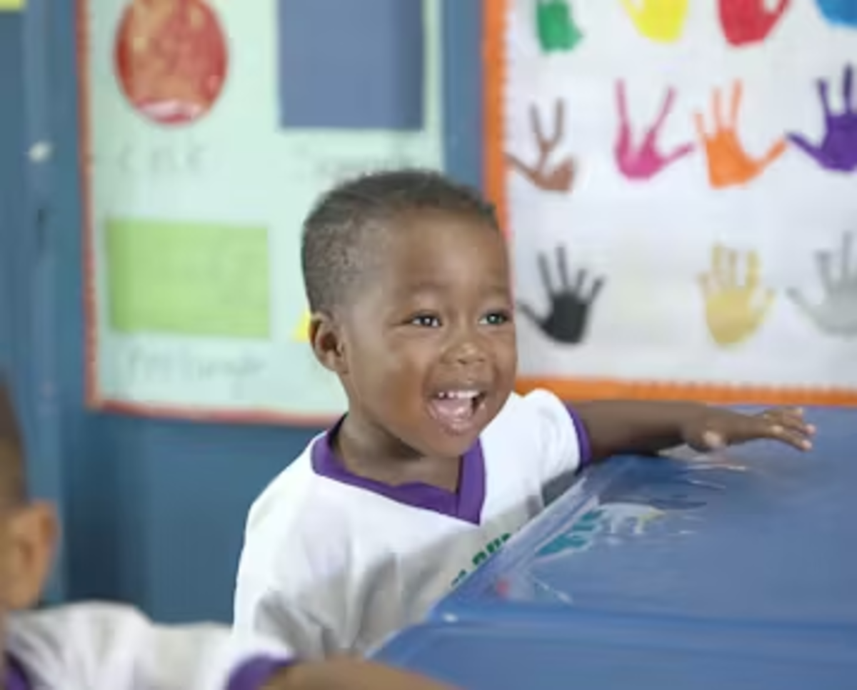 Child Learning from IVHQ Volunteers in St Mary Jamaica