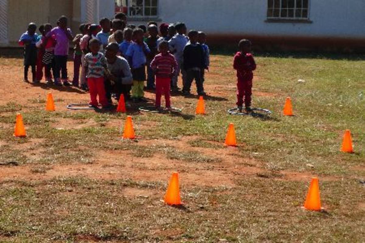 children learning concept of relay race sports
