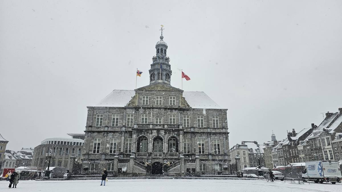 City hall at the Markt square in Maastricht on a snowy day