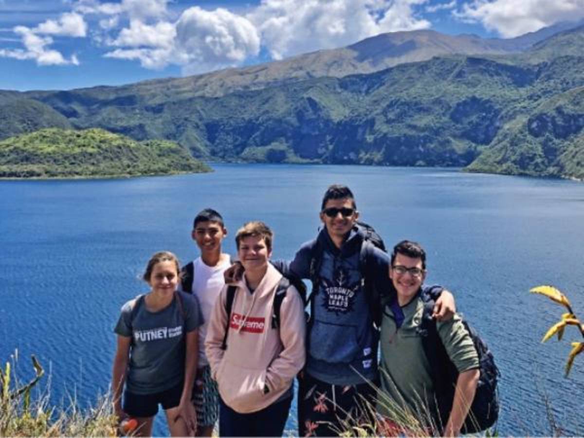 students at cuicocha crater lake in ecuador