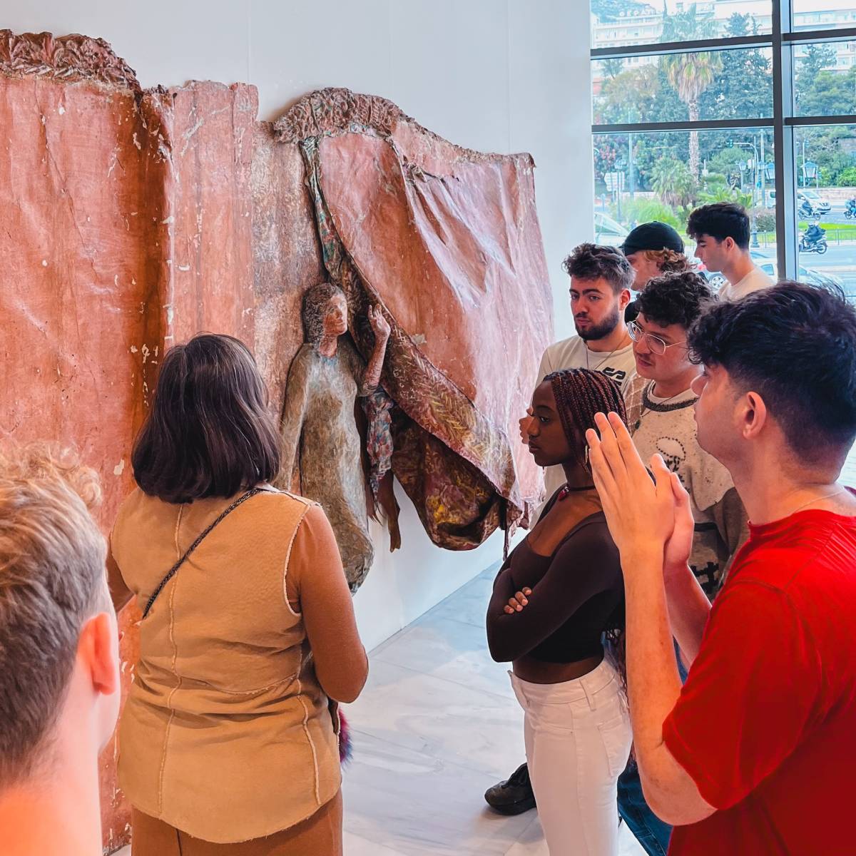 CYA students at museum looking at sculpture