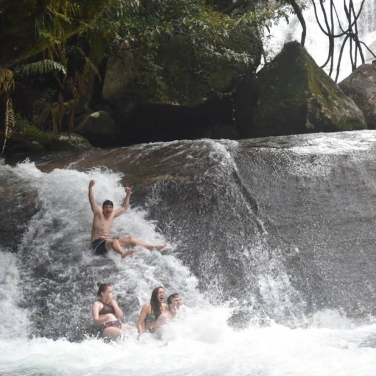 teens canyoneering on a summer trip to australia