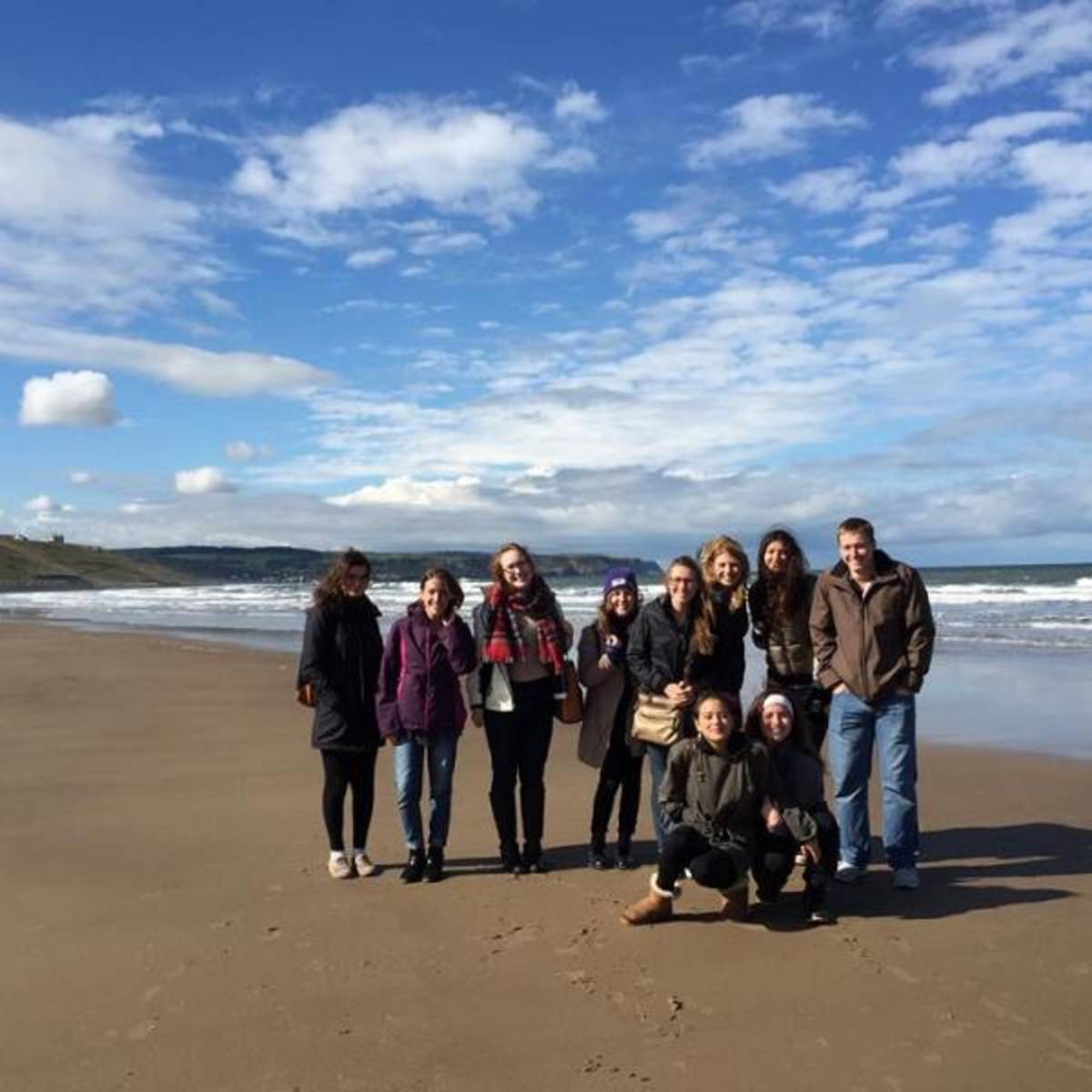 API students on the beach