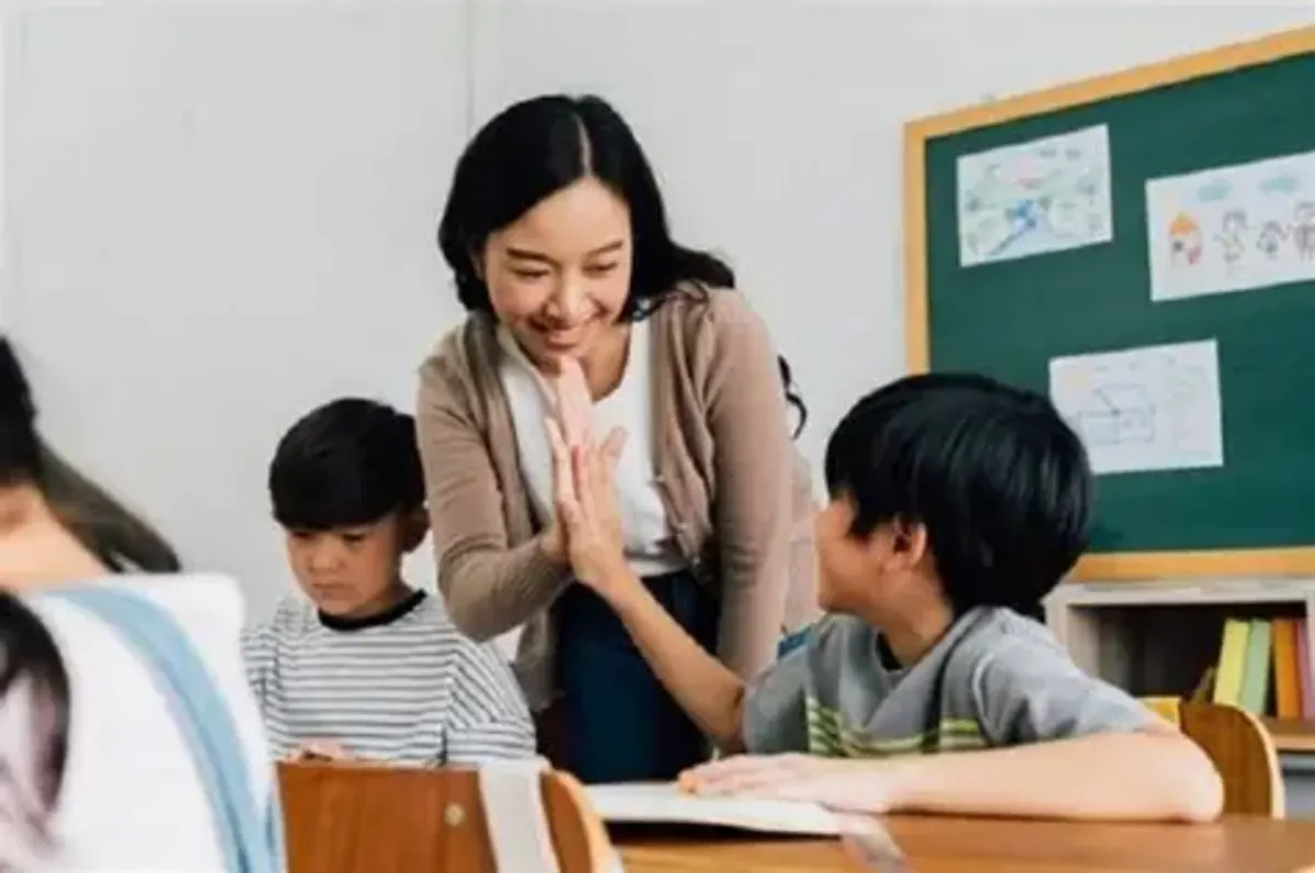 English teacher leading a classroom of students in Spain, part of a TEFL program abroad