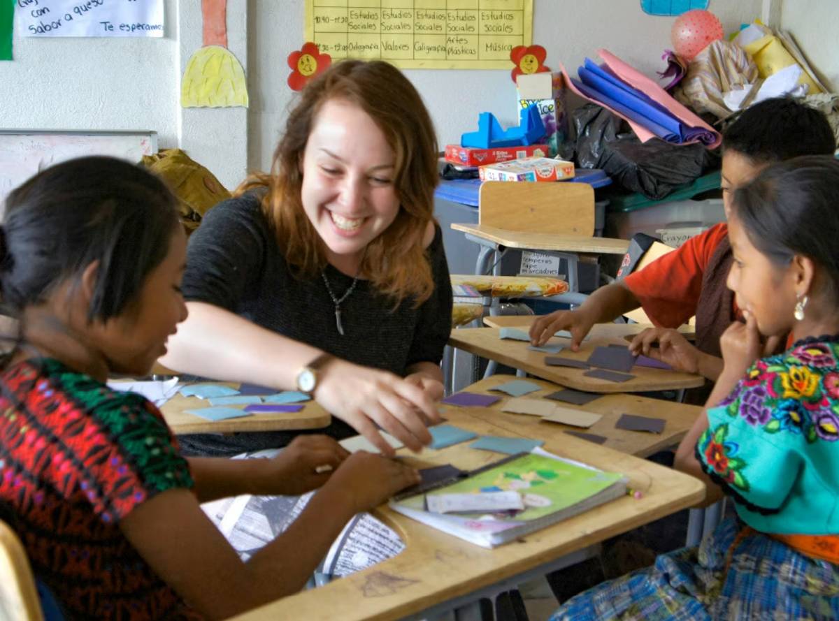 Female Volunteer Teaching Children in Guatemala